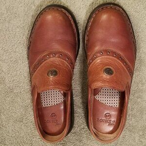 Western-themed leather clogs